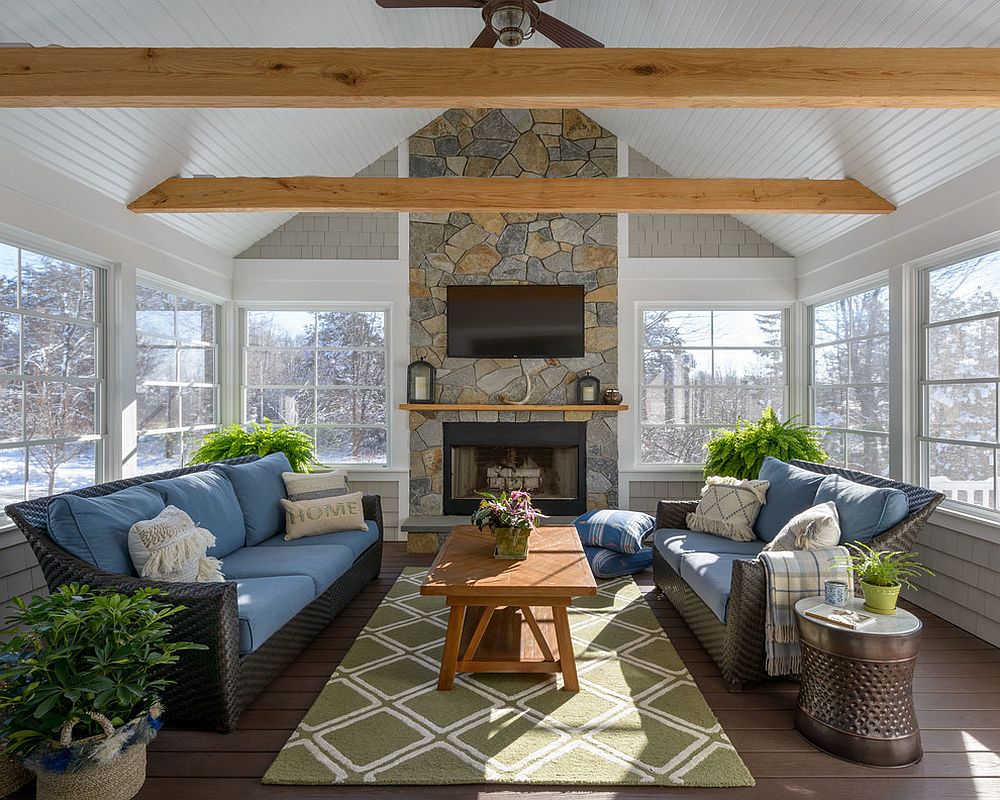 Placement-of-indoor-plants-brings-a-sense-of-symmetry-to-this-cool-modern-sunroom